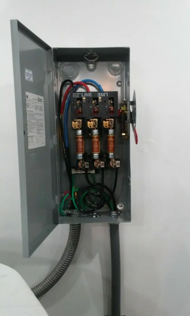 Three-phase disconnect switch installed for Smoke Detector Installation in Calverton