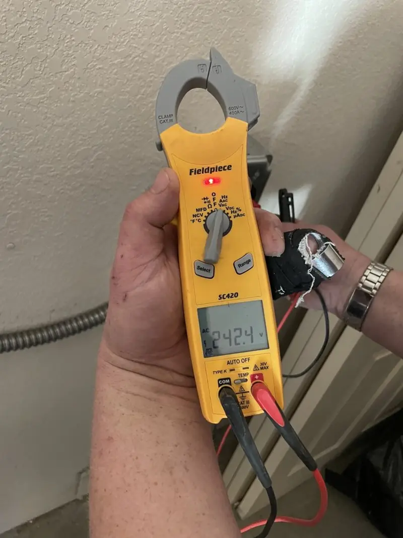 Voltage testing with clamp meter during Generator Installation in Calverton